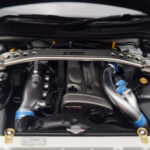 Nissan Skyline GT-R R34 Nismo Z-Tune Biały MotorHelix 1:18 - image 9 of 11