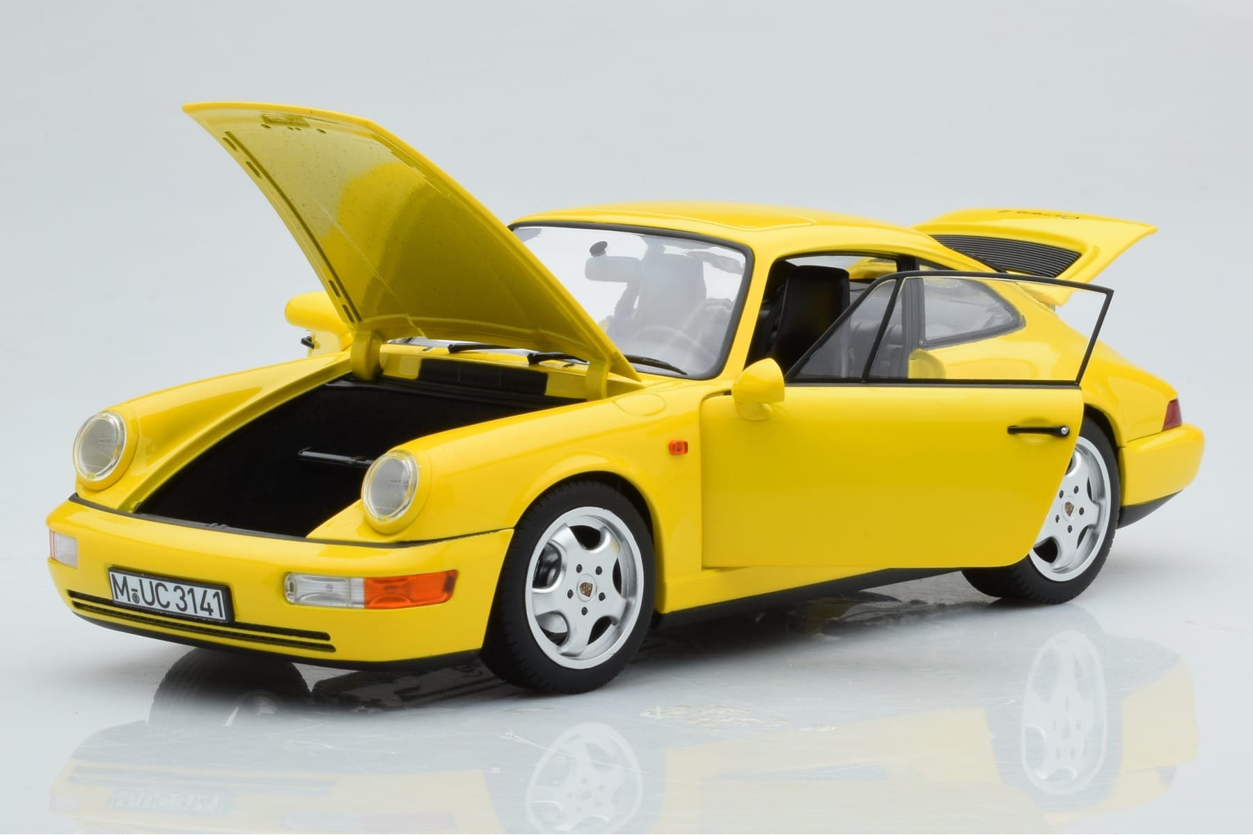 Porsche 911 964 Carrera 2 Żółty Norev 1:18 187328 Metal — zdjęcie 2 z 8