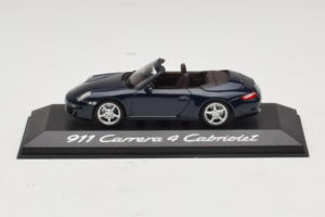 Porsche 911 997 Carrera 4 Kabriolet Ciemnoniebieski Minichamps 1:43 WAP02015216-R1 Metal